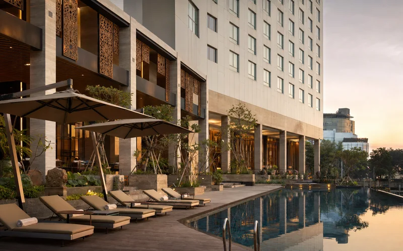 AI-generated modern Central Java business hotel scene inspired by Grand Mercure Solo Baru