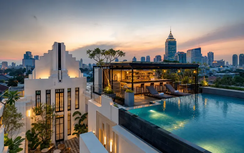 AI-generated editorial dusk view of The Hermitage, a Tribute Portfolio Hotel, Jakarta in Jakarta, Indonesia