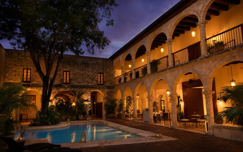 AI-generated editorial dusk view of Hodelpa Nicolas de Ovando in Santo Domingo, Dominican Republic