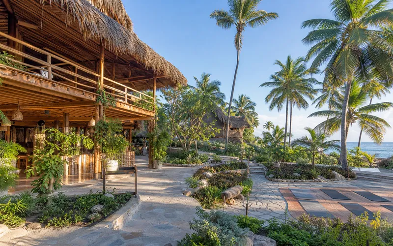 AI-generated realistic daylight view of Natura Cabana Boutique Hotel & Spa in Cabarete, Dominican Republic
