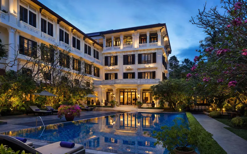 AI-generated editorial dusk view of Silk Path Hotel in Hue, Vietnam