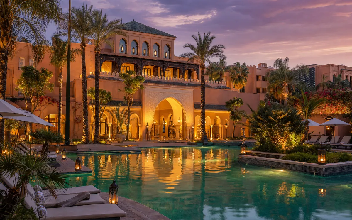AI-generated editorial dusk view of Sofitel Marrakech Palais Imperial & Spa in Marrakech, Morocco