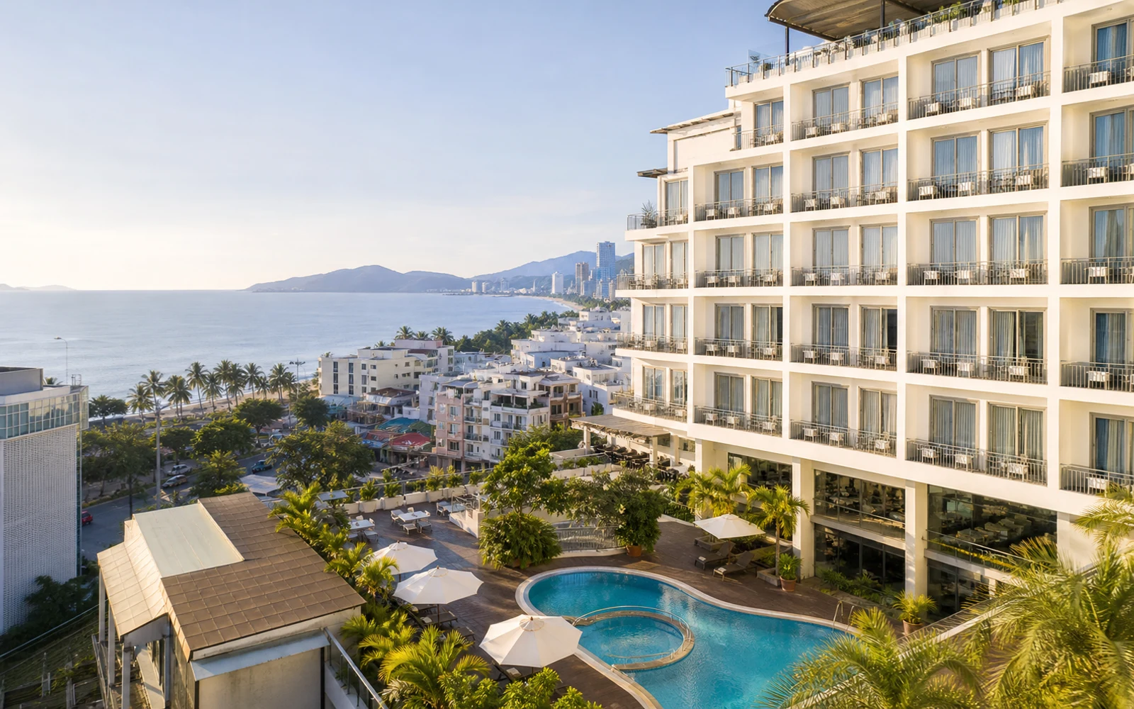AI-generated Nha Trang hotel pool and bay view inspired by TTC Hotel Michelia